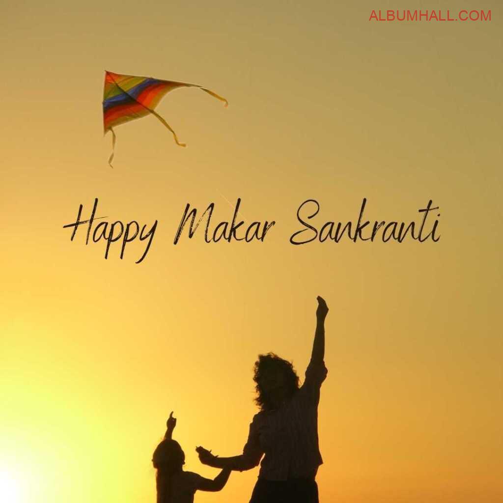 Father son flying multicolor kite on Sankrant
