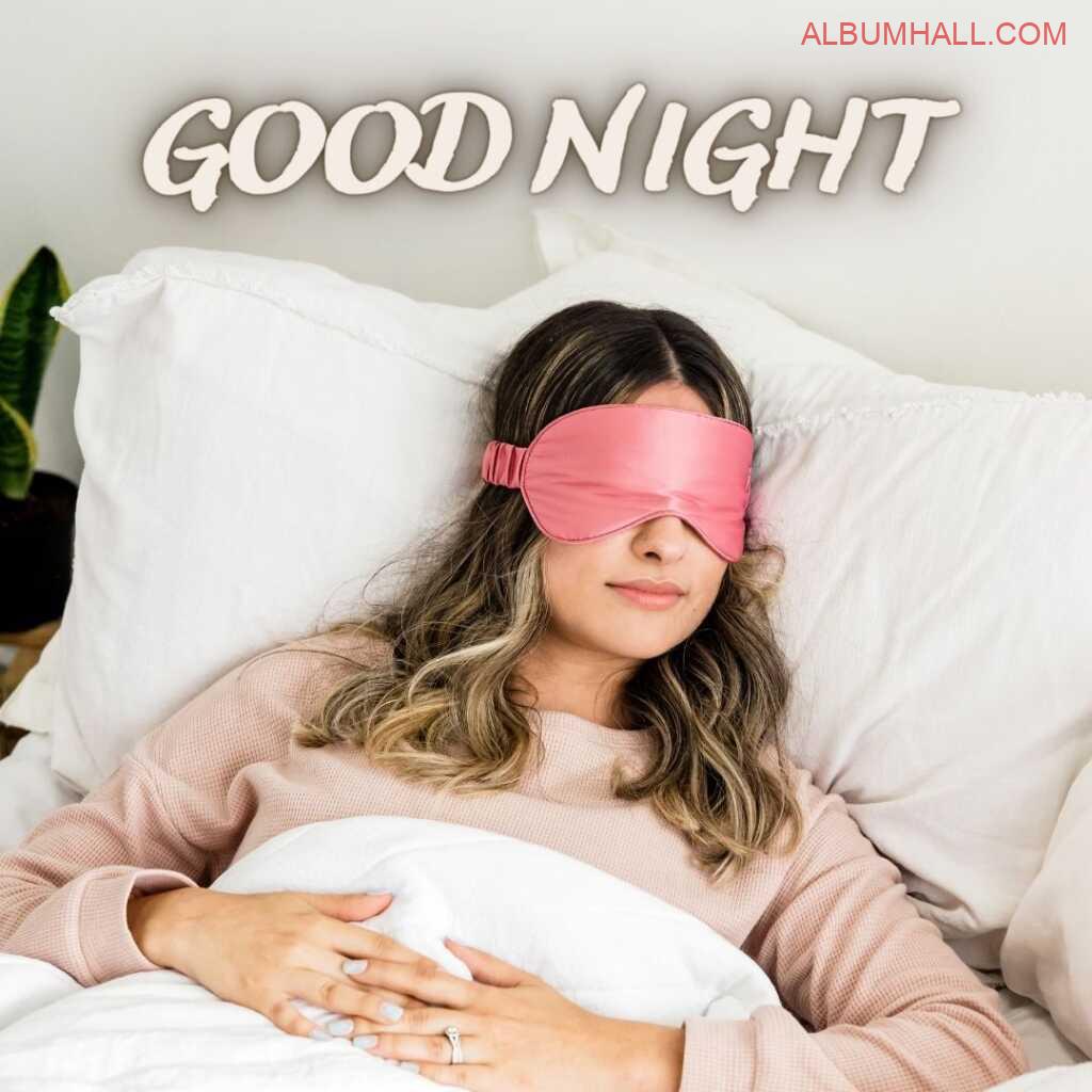 Girl with pink color eye blind and brown color hair sleeping on her bed in the night