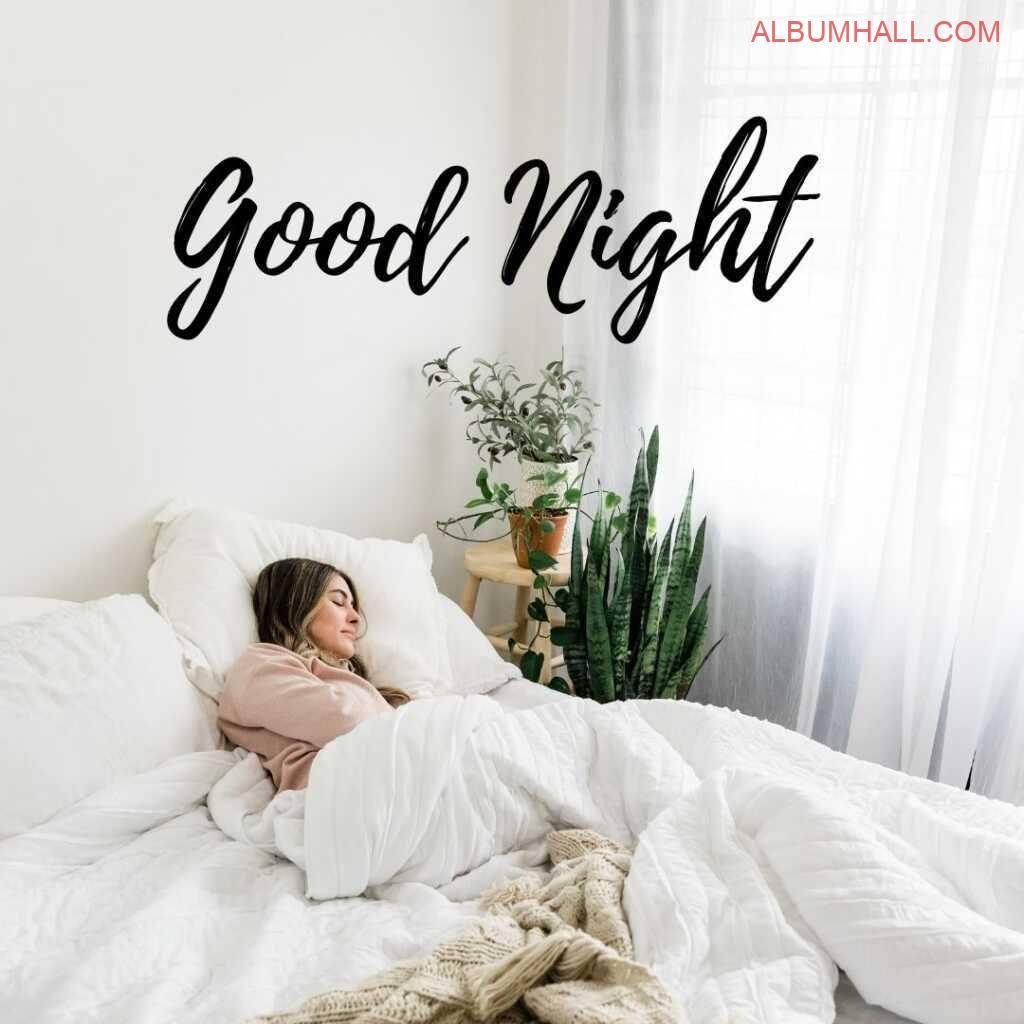 Girl with smile sleeping peacefully during night time on her white color bedsheet with beautiful plants around