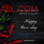 Red ribbon wrapped around red rose to gift special one on rose day lying on black color table