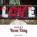 "LOVE" word written with white and red petals in big letters with Happy Rose day note below