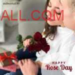 Couple sitting close together embracing each other with girl holding card, gift box and bunch of red roses given by her boyfriend on the rose day
