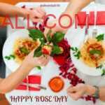 Couple holding rose in hands on the dinner table with rose petals, noodles candles and gift around the white cloth table