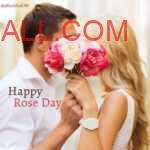 a Couple kissing and holding bouquet of red white roses to wish each other Happy Rose Day