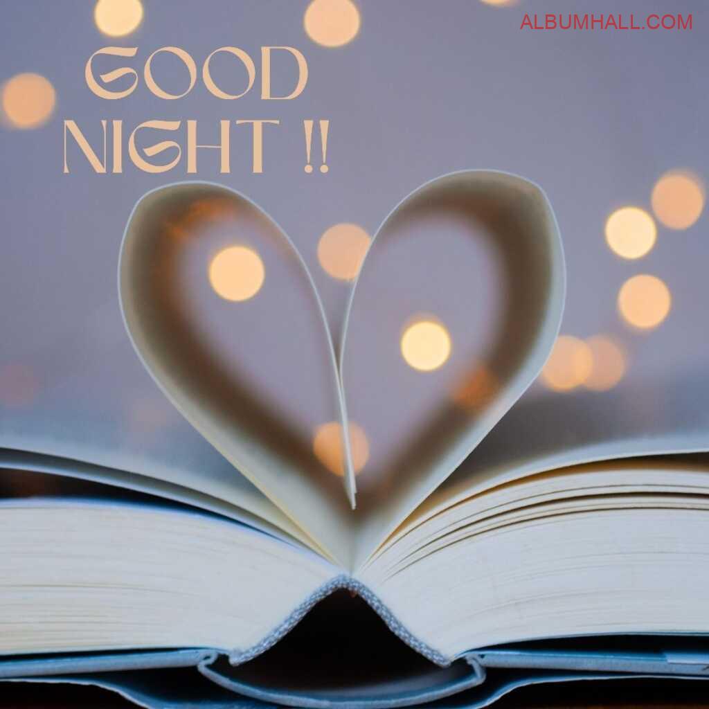 Heart popping out of the open book reflecting the lights around and saying good night