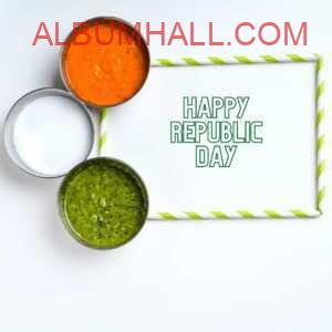 green, saffron and white colors in bowl on white table to wish republic day in green striped frame