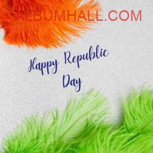 Tricolor feathers kept in flag shape with republic day wishes on table