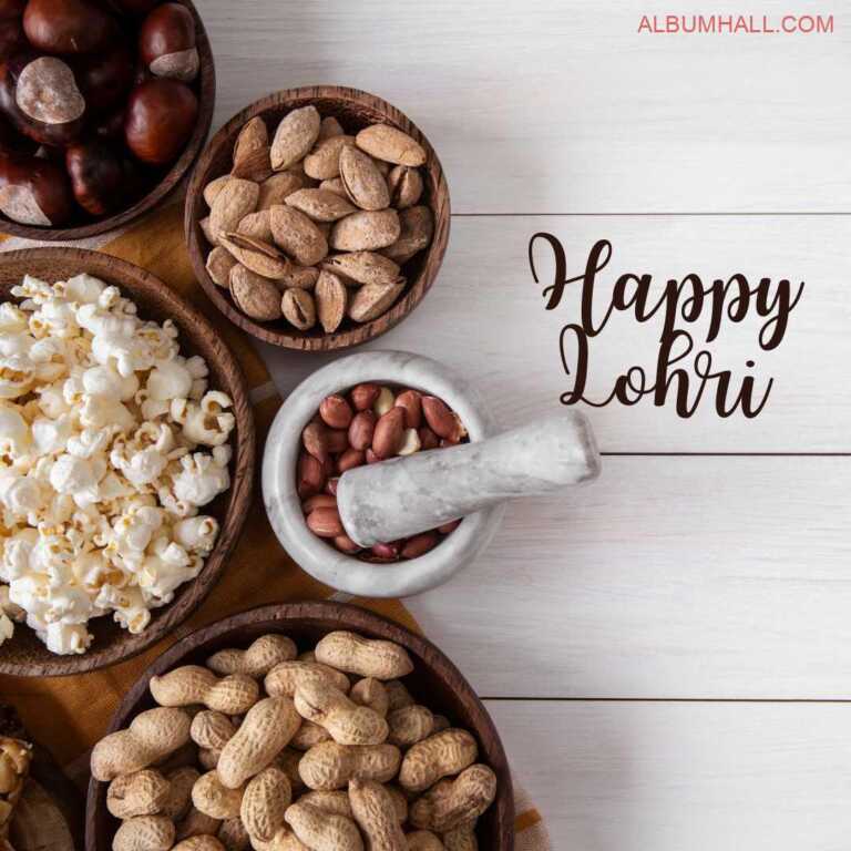 different lohri special sweets and preparation material around on white table