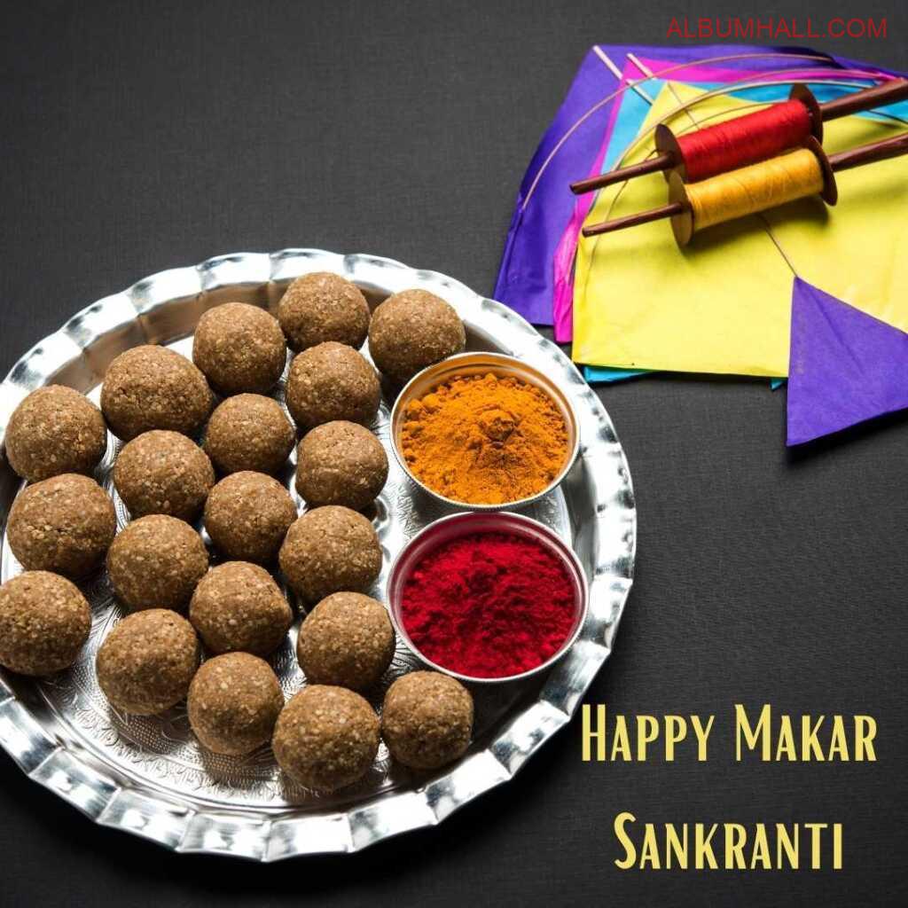 Makar sankranti special plate with till ladoos, color and kites