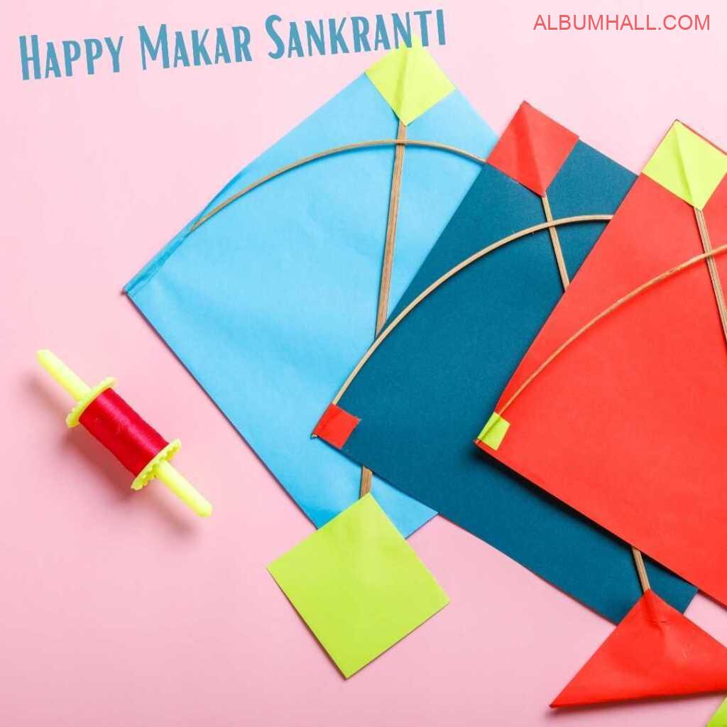 Red thread with three colored Sankrant kites lying together