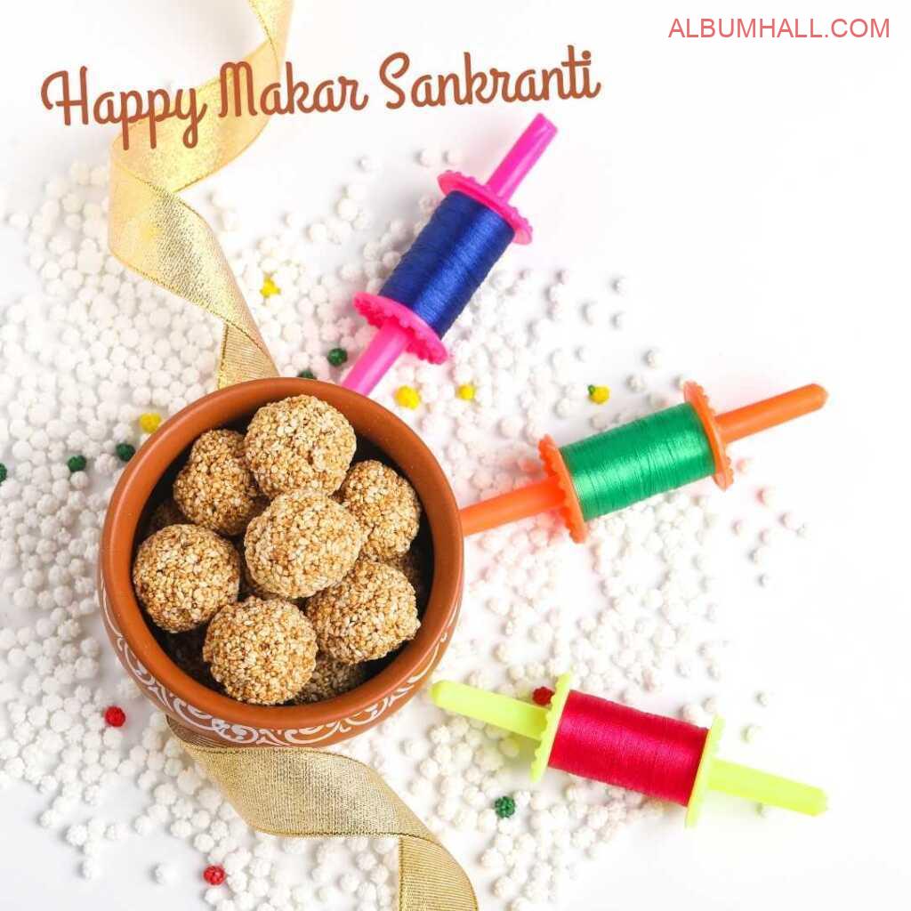 Sankrant special items like matka, ladoo and thread on a decorated table