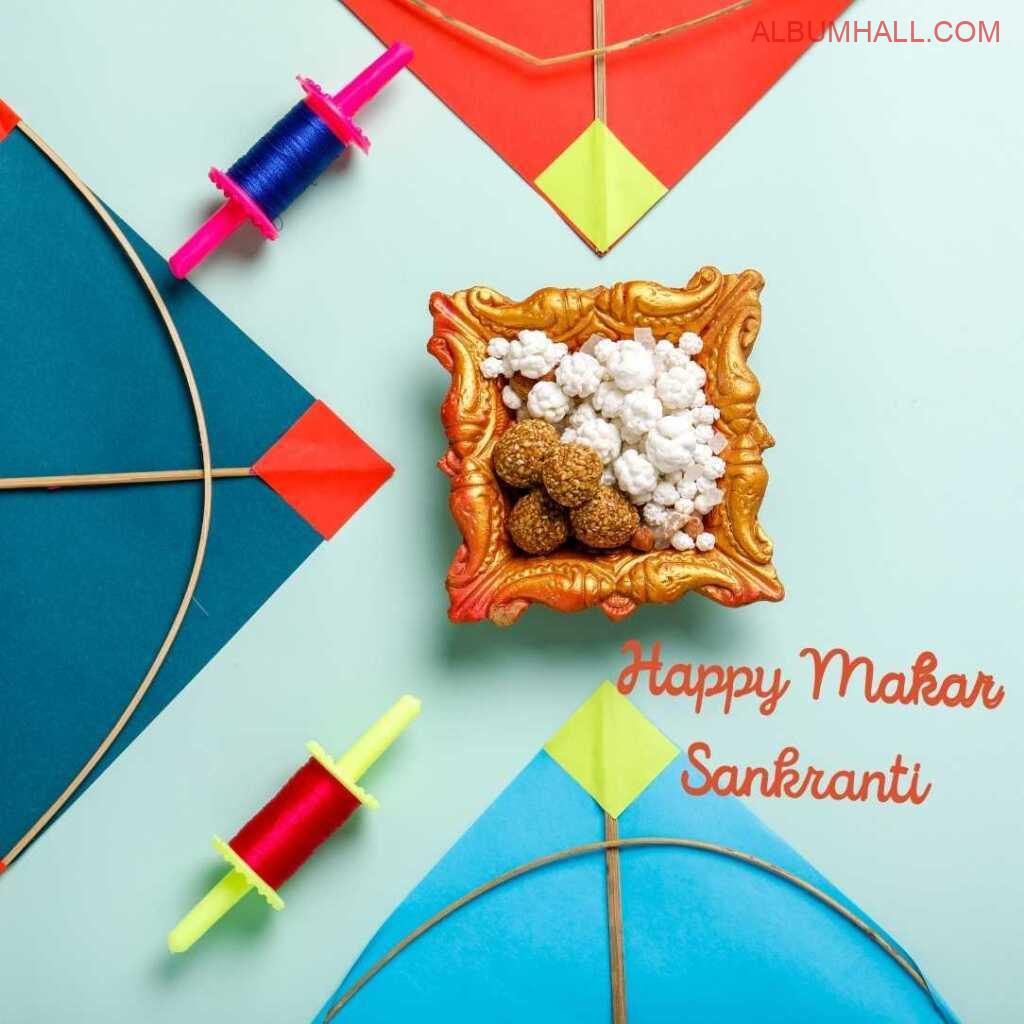 Sankrant kites threads and sweets with sweets bowl
