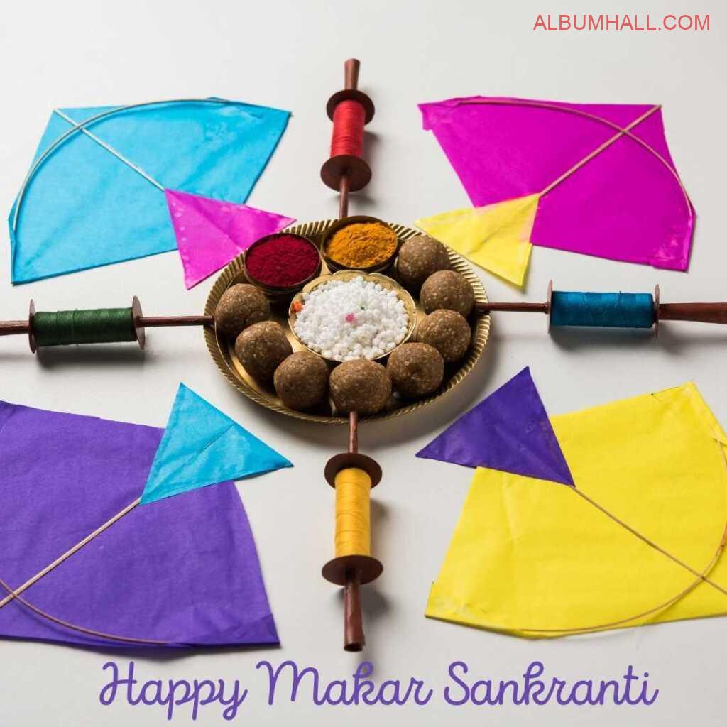 Sankrant ladoos with kites and thread in circle
