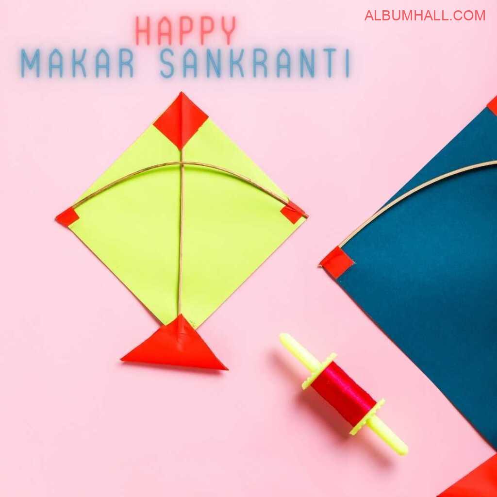 Sankrant special Kites and red thread lying on table