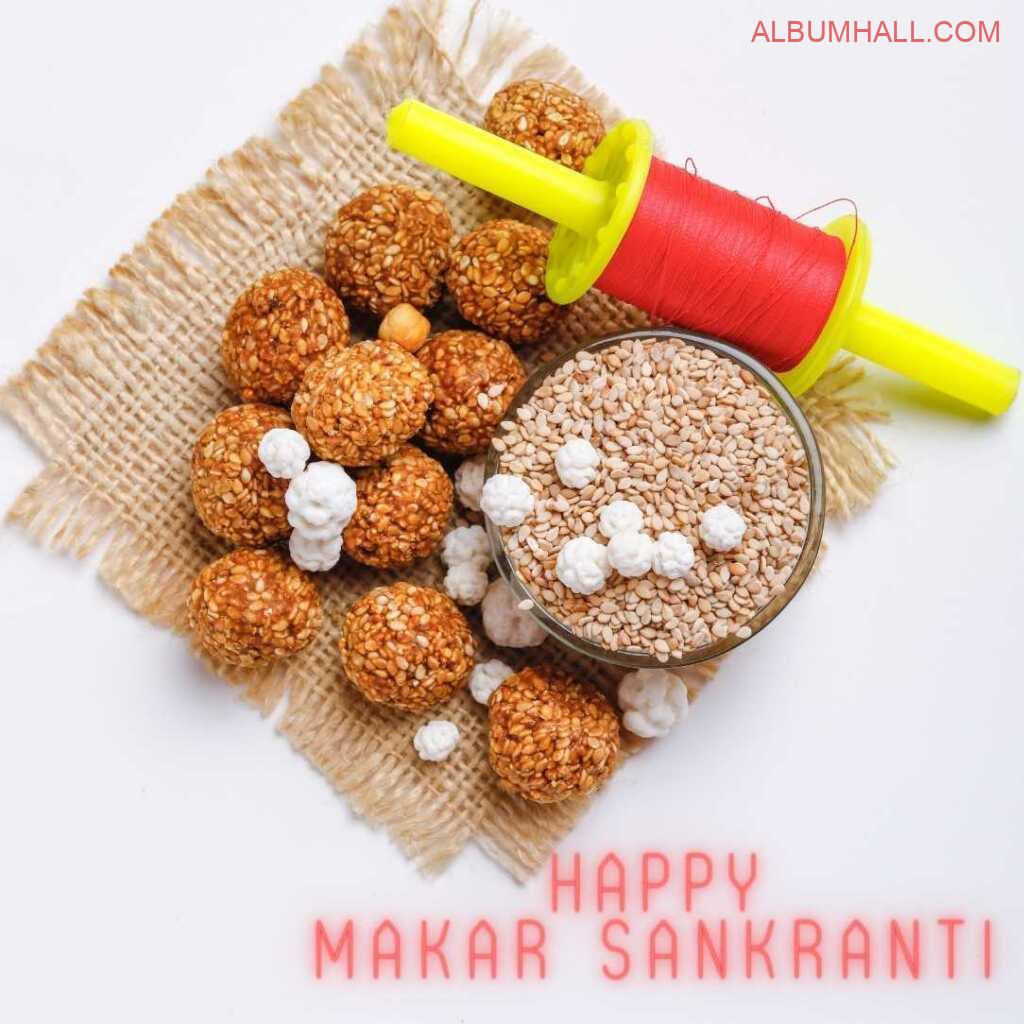 Sankrant sweets on rug and thread