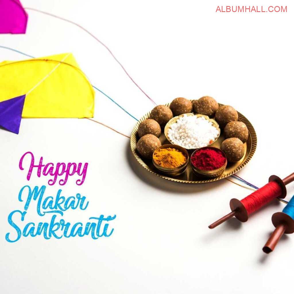 spread across with Sankrant ladoos, kites and colors around table