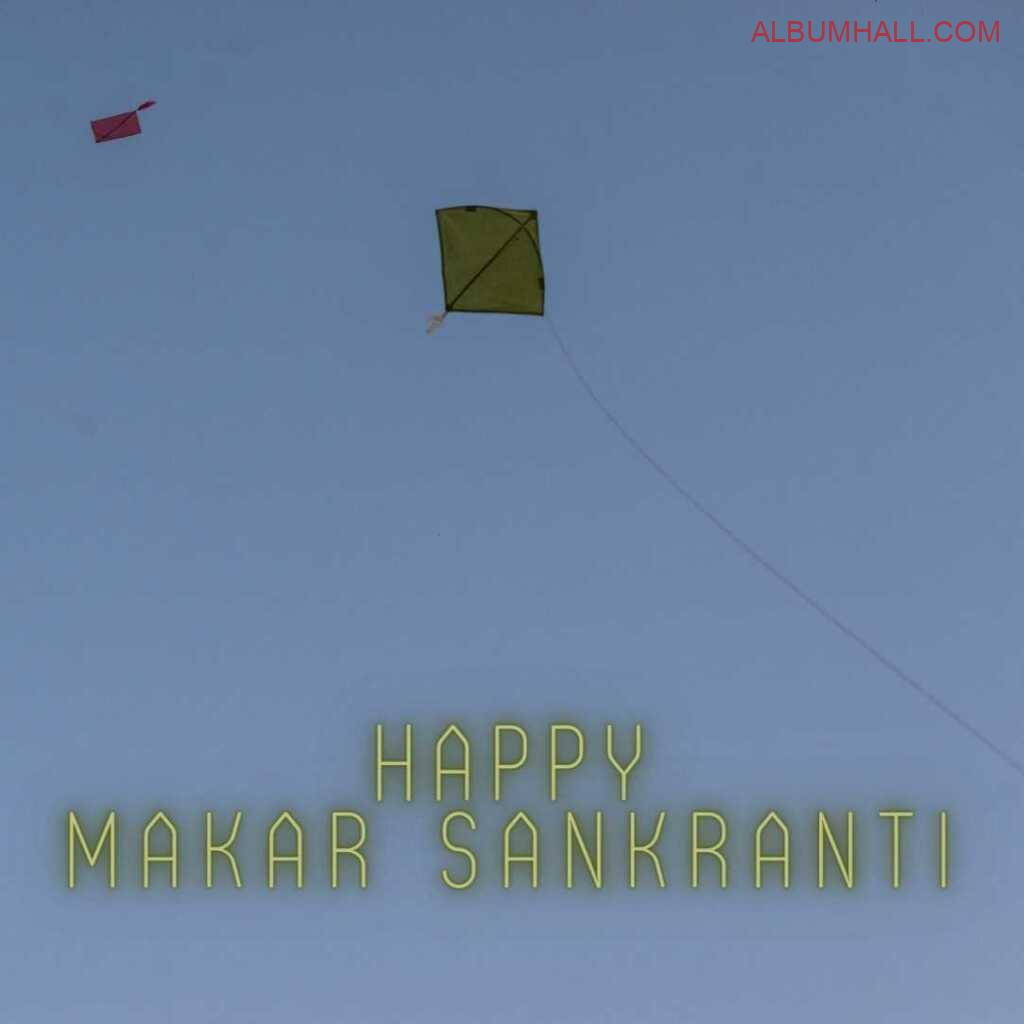 Pink and Yellow Kite flying in sky on Sankrant
