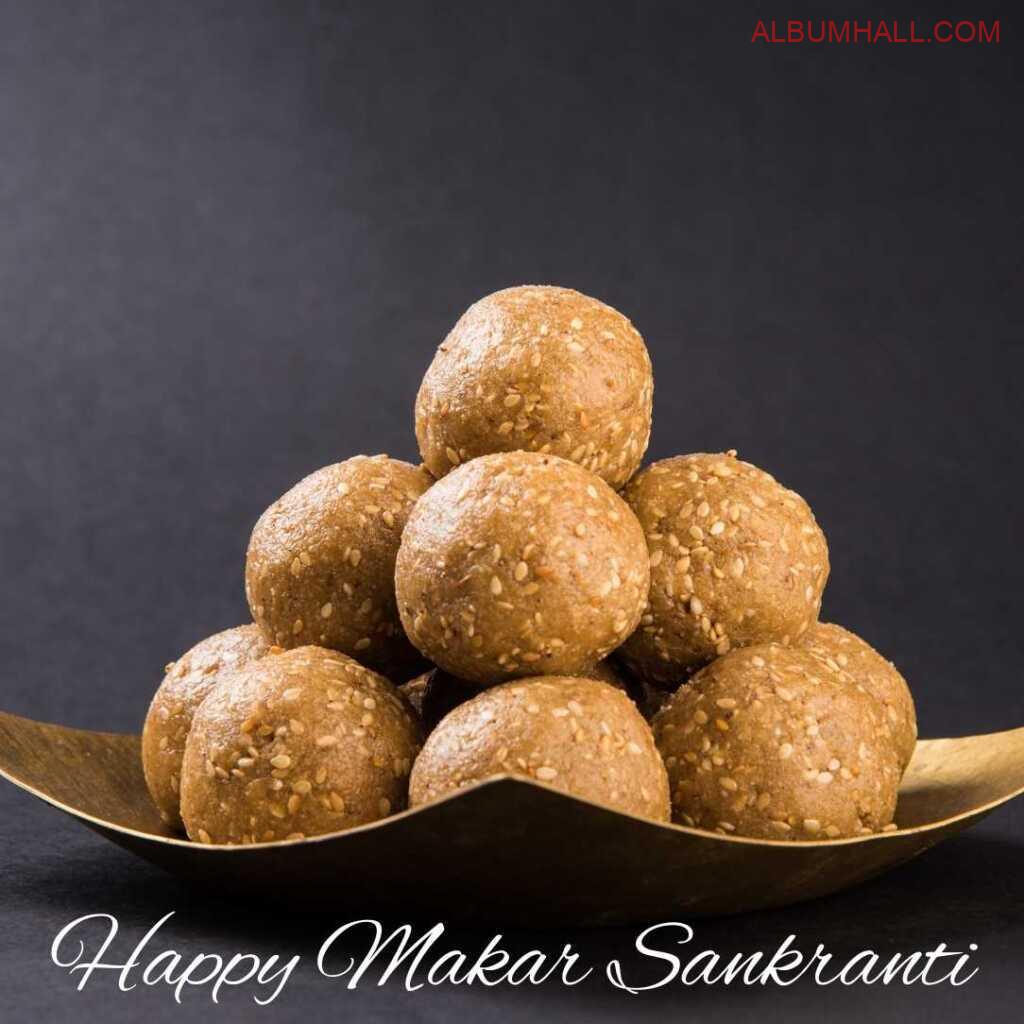 golden tray filled with Sankrant ladoos on table