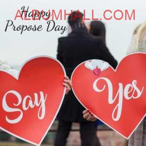 couple hugging and and answer board "Say Yes"