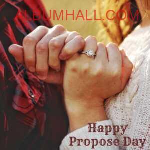 couple holding hands close to each other promising each other on propose day