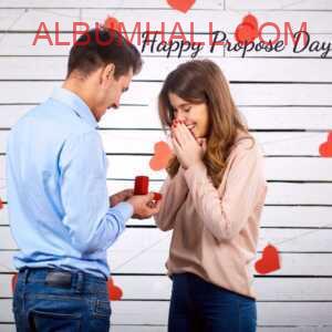 happy propose day my love - boy proposing to his girl with ring in red box