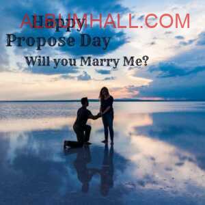 happy propose day my love - boy proposing to his girl kneeling down on a beach