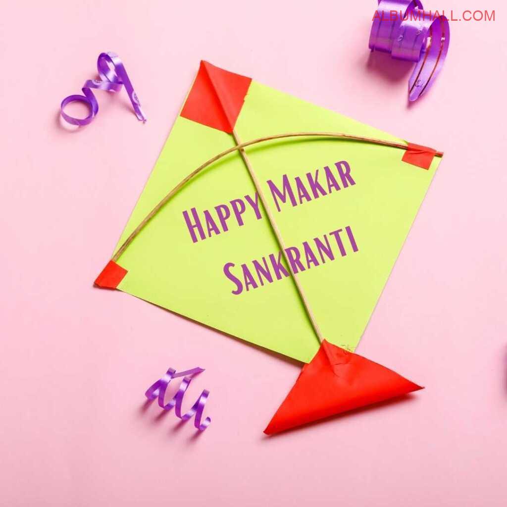 purple ribbons around yellow & red Sankrant kite