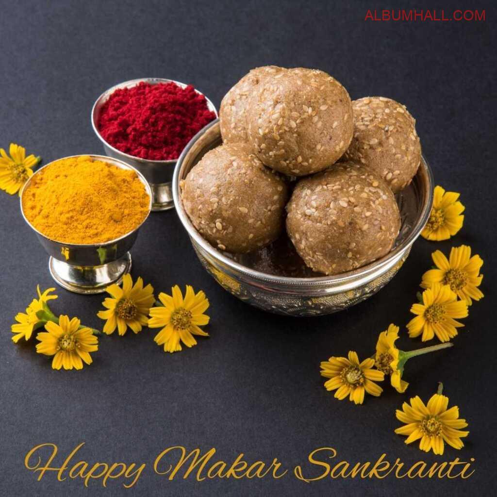 yellow flowers spread across with Sankrant ladoos and colors around table